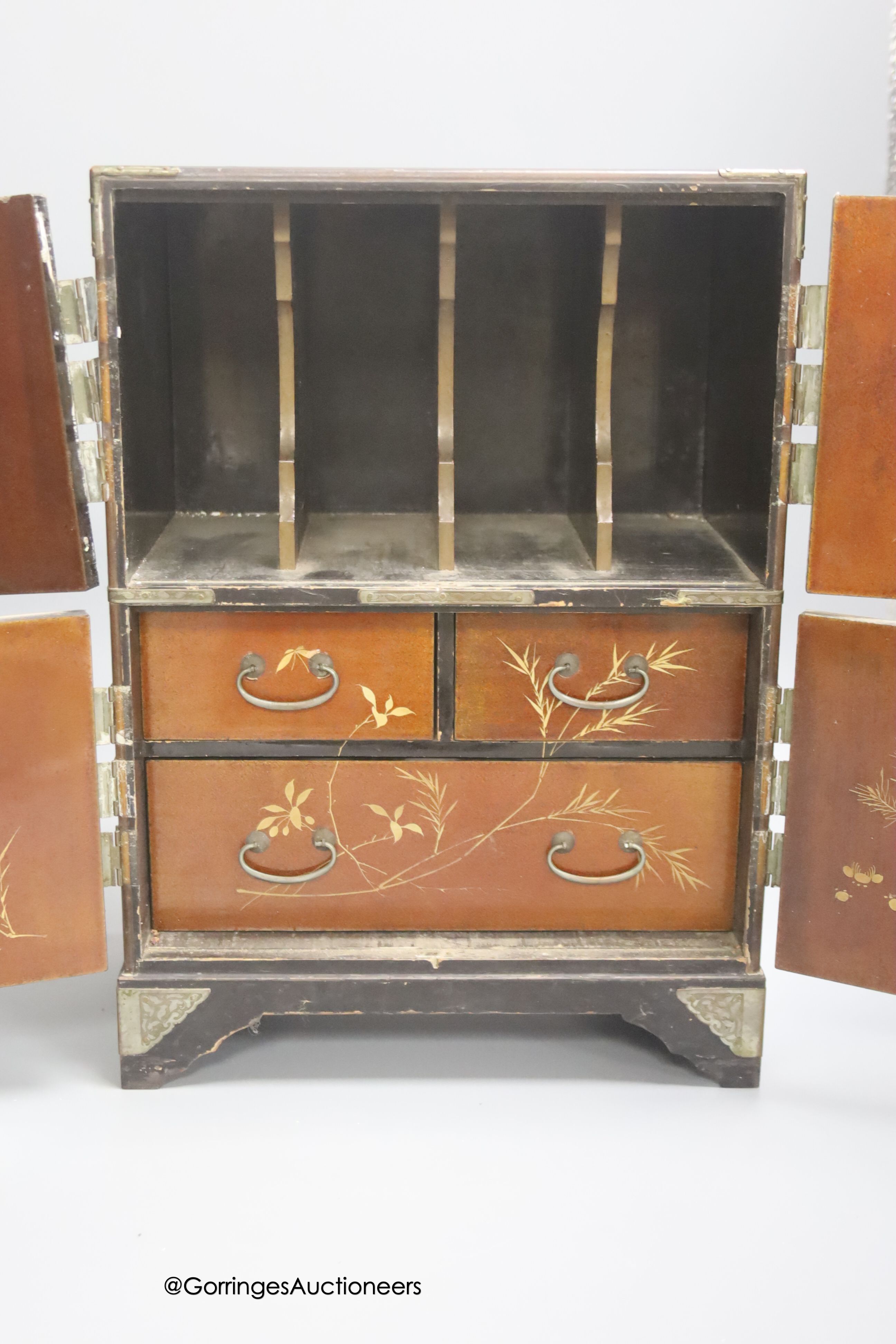 A Japanese lacquer table cabinet, height 33cm